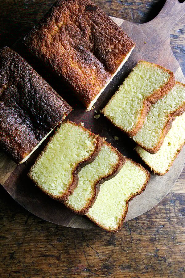 This lemon cake is so incredibly moist — I know! Sorry. But there's no other word, is there? — and delicious and perfectly sweet and lemony. For me, it doesn't get much better than a lemon loaf cake, and this one is about as ideal as can be. // alexandracooks.com Two loaves of lemon semolina cake, sliced.