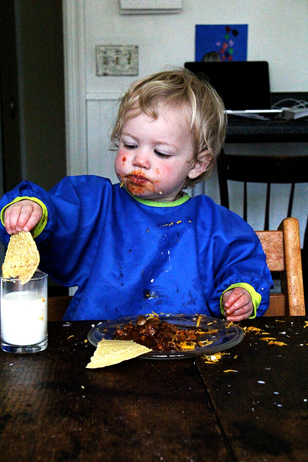 Tig, dunking tortillas into milk.
