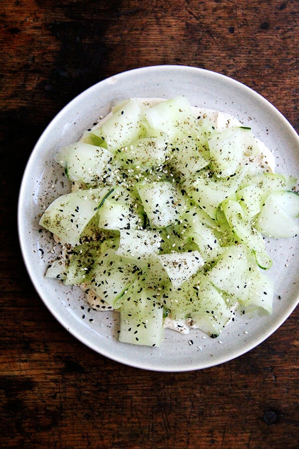 This cucumber salad with tahini-yogurt sauce essentially is a no-cook meal, a refreshing salad to make good use of those cool summer cucs, which might just be arriving in droves. I serve it along side broiled slices of ciabatta. Yum. // alexandracooks.com This cucumber salad with tahini-yogurt sauce essentially is a no-cook meal, a refreshing salad to make good use of those cool summer cucs, which might just be arriving in droves. I serve it along side broiled slices of ciabatta. Yum. // alexandracooks.com