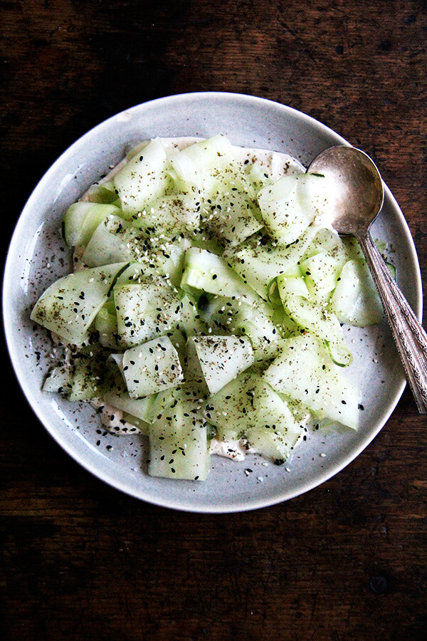 This cucumber salad with tahini-yogurt sauce essentially is a no-cook meal, a refreshing salad to make good use of those cool summer cucs, which might just be arriving in droves. I serve it along side broiled slices of ciabatta. Yum. // alexandracooks.com This cucumber salad with tahini-yogurt sauce essentially is a no-cook meal, a refreshing salad to make good use of those cool summer cucs, which might just be arriving in droves. I serve it along side broiled slices of ciabatta. Yum. // alexandracooks.com