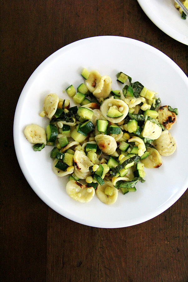 This recipe calls for toasted orecchiette in a hot skillet in a little bit of olive oil. It's a simple step, but one that provides this zucchini and corn pasta with a little more texture, color, and flavor. // alexandracooks.com This recipe calls for toasted orecchiette in a hot skillet in a little bit of olive oil. It's a simple step, but one that provides this zucchini and corn pasta with a little more texture, color, and flavor. // alexandracooks.com