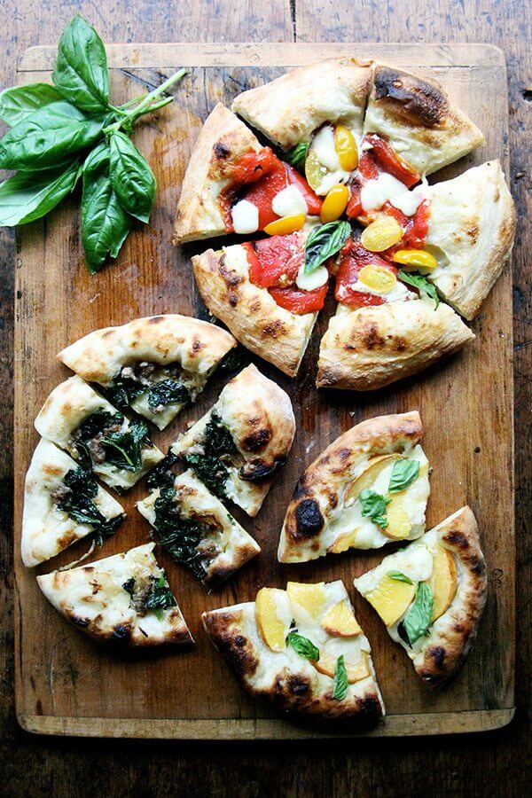 Here are recipes for three summer pizzas — peach and basil, broccoli rabe and sausage, and roasted red pepper and tomato — plus a few pizza-making tips. And even in the summer heat, each colorful crème fraîche-slicked pie makes every second spent in my sultry kitchen well worth it. // alexandracooks.com Here are recipes for three summer pizzas — peach and basil, broccoli rabe and sausage, and roasted red pepper and tomato — plus a few pizza-making tips. And even in the summer heat, each colorful crème fraîche-slicked pie makes every second spent in my sultry kitchen well worth it. // alexandracooks.com