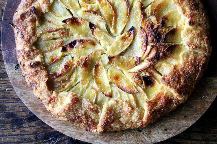 An overhead shot of an apple-frangipane galette.