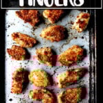 Baked chicken fingers on a sheet pan.