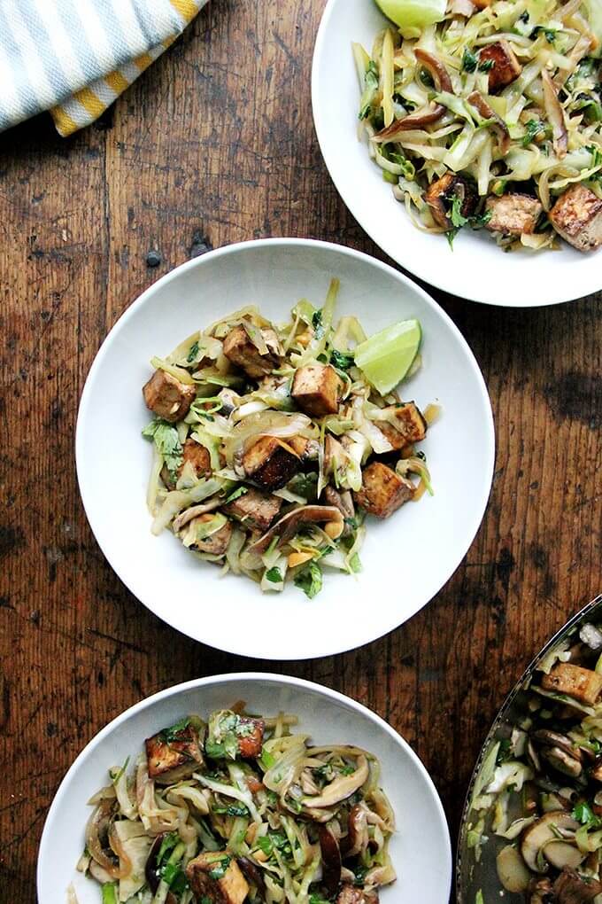 In this cabbage pad thai, sugar and lime juice in the stir-fry sauce stand in for tamarind, whose fruity, tart flavor lends that sweet-and-sourness characteristic of traditional pad Thai. This dish comes together quickly, and while the vegetables and seasonings may be unorthodox, the combination is tasty and satisfying. // alexandracooks.com In this cabbage pad thai, sugar and lime juice in the stir-fry sauce stand in for tamarind, whose fruity, tart flavor lends that sweet-and-sourness characteristic of traditional pad Thai. This dish comes together quickly, and while the vegetables and seasonings may be unorthodox, the combination is tasty and satisfying. // alexandracooks.com