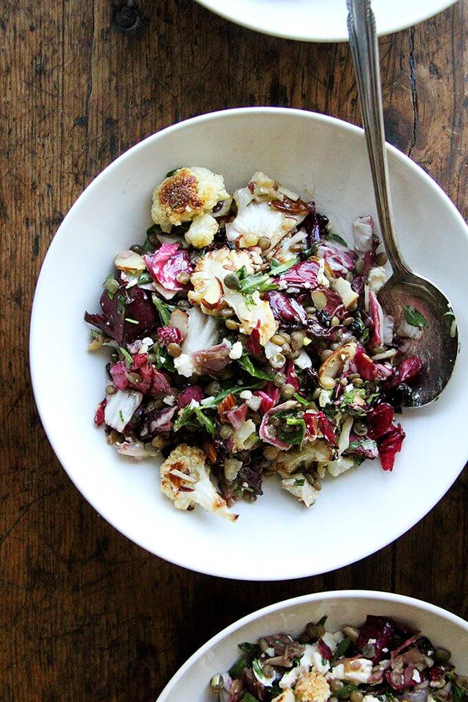 This salad is a combination of roasted vegetables, lentils, walnuts, and goat cheese. But there's a lot more to it than what's revealed in the title. There's raw radicchio, lots of fresh tarragon, and it's all dressed in an at once sharp, sweet, and salty dressing made with minced anchovies, shallots, mustard, honey, and currants. The whole combination is just so good. // alexandracooks.com This salad is a combination of roasted vegetables, lentils, walnuts, and goat cheese. But there's a lot more to it than what's revealed in the title. There's raw radicchio, lots of fresh tarragon, and it's all dressed in an at once sharp, sweet, and salty dressing made with minced anchovies, shallots, mustard, honey, and currants. The whole combination is just so good. // alexandracooks.com
