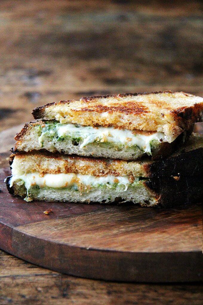 This ‘nduja grilled cheese includes Wisconsin fontina, a great melting cheese, and basil pesto, to offer a fresh counterpoint to the richness of the pâte-like spread. In keeping with the Italian theme, I sandwiched the three ingredients between thick slices of ciabatta, whose porous crumb so nicely absorbed the flavors of the spicy ‘nduja and sweet, earthy fontina. Yum. // alexandracooks.com This ‘nduja grilled cheese includes Wisconsin fontina, a great melting cheese, and basil pesto, to offer a fresh counterpoint to the richness of the pâte-like spread. In keeping with the Italian theme, I sandwiched the three ingredients between thick slices of ciabatta, whose porous crumb so nicely absorbed the flavors of the spicy ‘nduja and sweet, earthy fontina. Yum. // alexandracooks.com