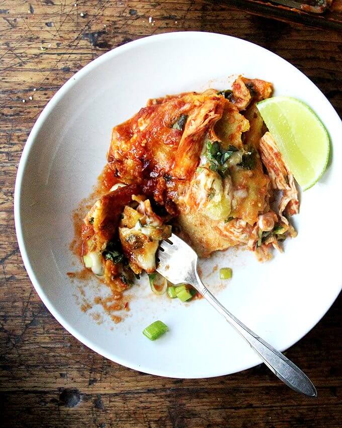 I love this recipe for no-fuss enchiladas, because it's extremely simple and incredibly flavorful. There's no frying of the tortillas, no dipping of the tortillas in sauce, no stuffing and rolling—there's nothing that might keep you from making enchiladas as often as you would like. // alexandracooks.com I love this recipe for no-fuss enchiladas, because it's extremely simple and incredibly flavorful. There's no frying of the tortillas, no dipping of the tortillas in sauce, no stuffing and rolling—there's nothing that might keep you from making enchiladas as often as you would like. // alexandracooks.com