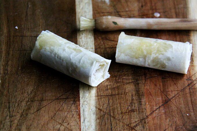 Salami and provolone phyllo rolls, rolled into little burritos.