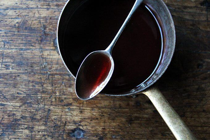 A saucepan filled with finished gastrique. 