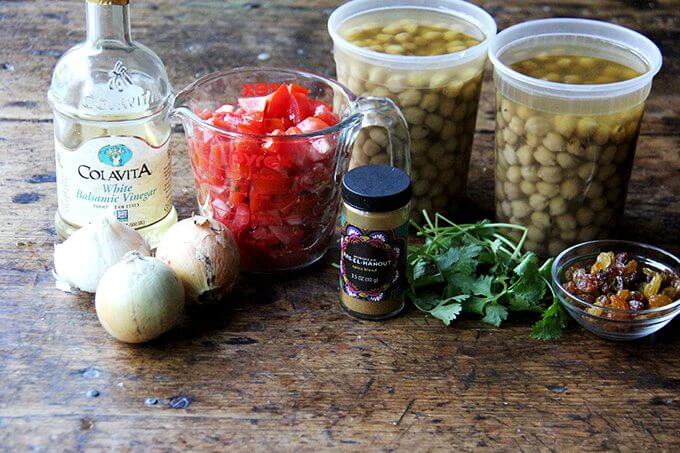 The ingredients for the chickpea tagine on a table.