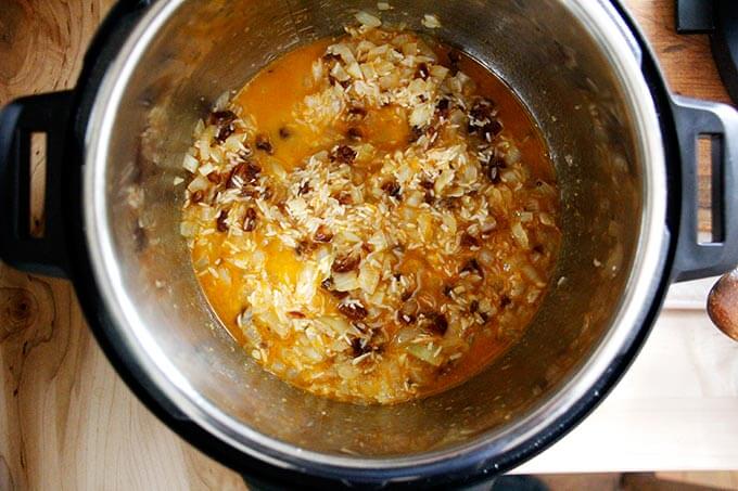 Instant Pot Moroccan Rice ready to be sealed and cooked.