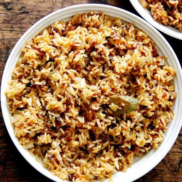 A bowl of Moroccan Rice with dates and harissa.