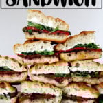 A stack of focaccia slab sandwiches.