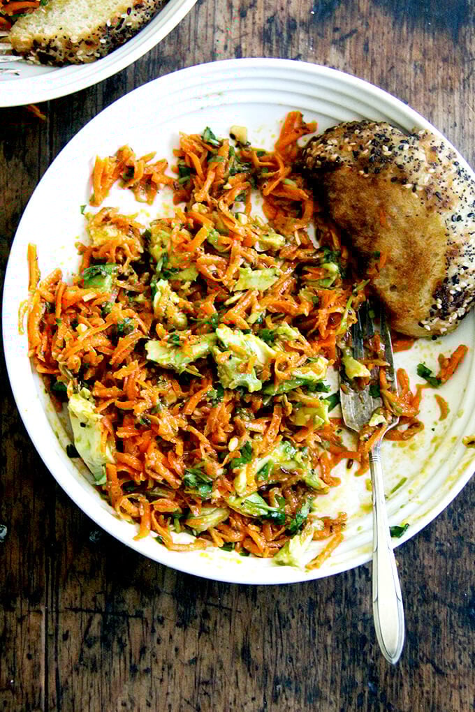 A plate of Moroccan carrot salad with avocado.