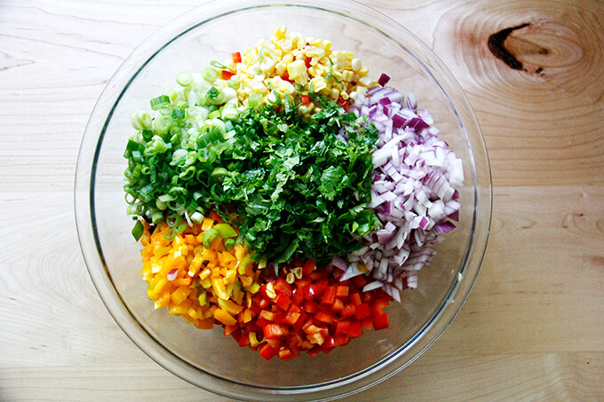 A bowl with all of the ingredients for Texas Caviar.