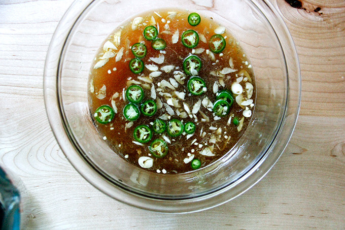A bowl filled with homemade nuoc cham.