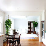 A view of a recently remodeled kitchen with reclaimed heart pine floors.