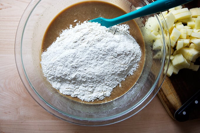 Adding dry-ingredients to wet.