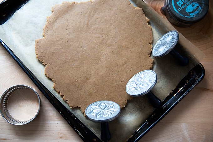 Nordic Ware Starry Night Cookie Stamp Set aside rolled out cookie dough on a sheet pan.