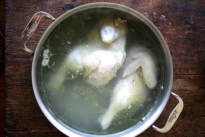 chicken in pot with water