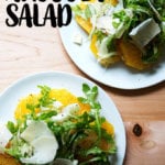 A plate of orange-arugula salad.