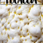 Unbaked sourdough focaccia.