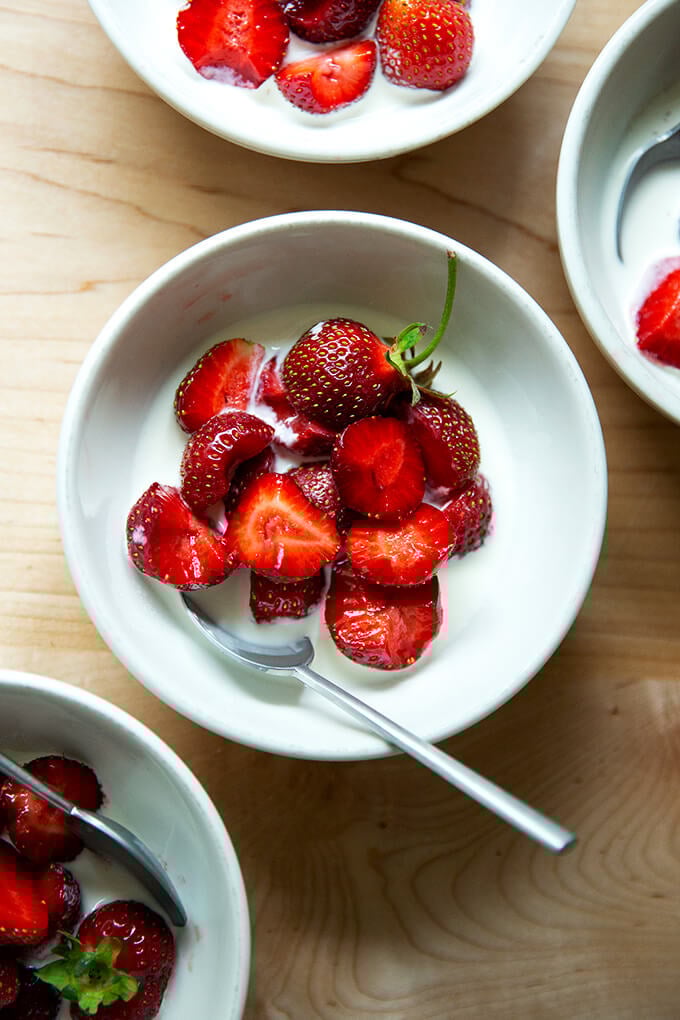 A bowl of strawberries + cream