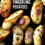 A cast iron skillet filled with crispy fingerling potatoes.