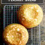 A cooling rack with gluten-free peasant bread.