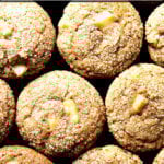 A pan of freshly baked apple orchard muffins.