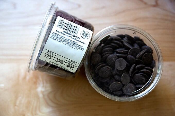 A tub of 64% cacao chocolate wafers.