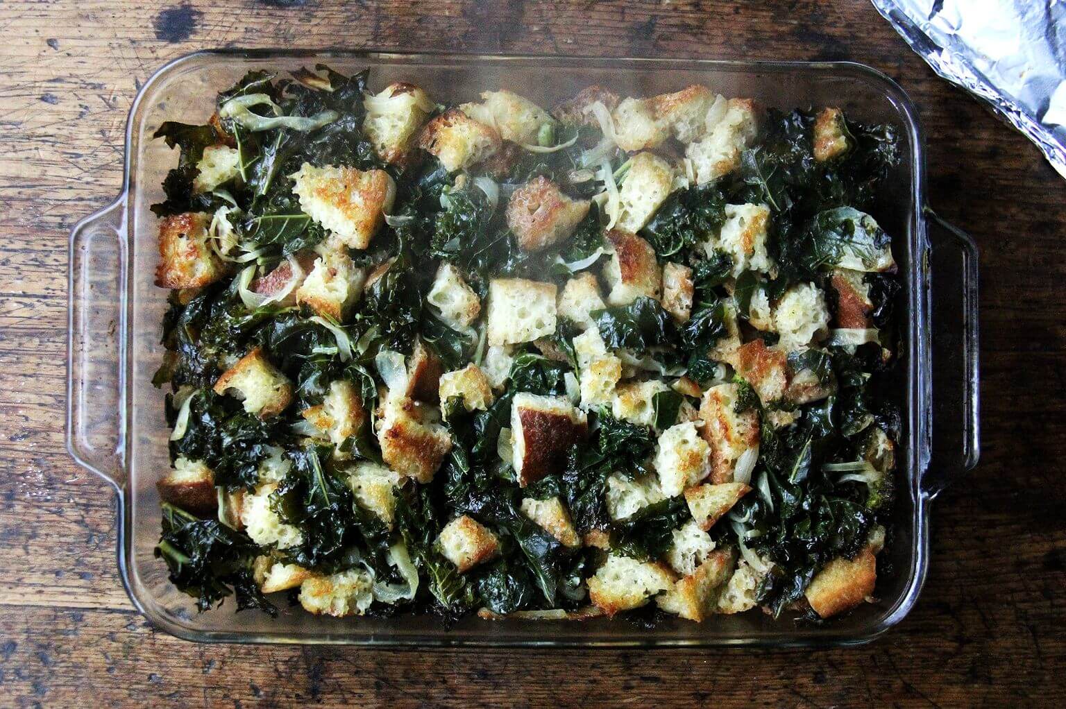 A 9x13-inch pan filled with just-baked stuffing, baked directly from the freezer.