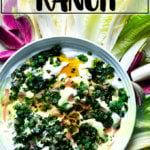 A bowl of homemade ranch dip with Greek yogurt aside assorted vegetables.