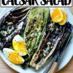 A platter of charred Romaine salad with soft-boiled eggs.