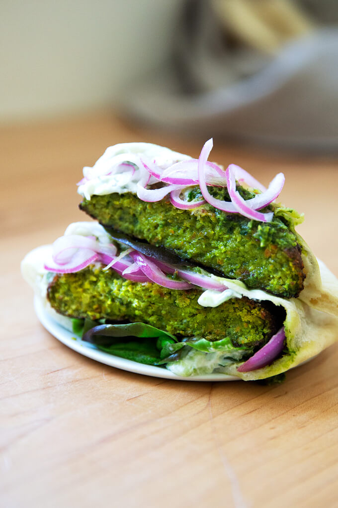 Falafel burgers on a plate.