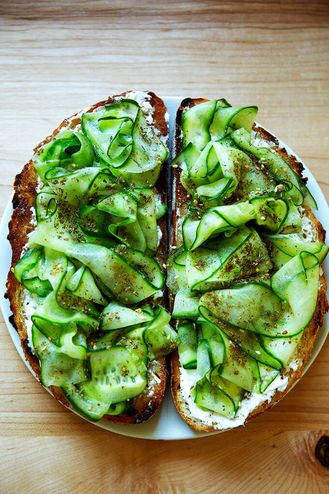 Cucumber toast with labneh and dukkah.