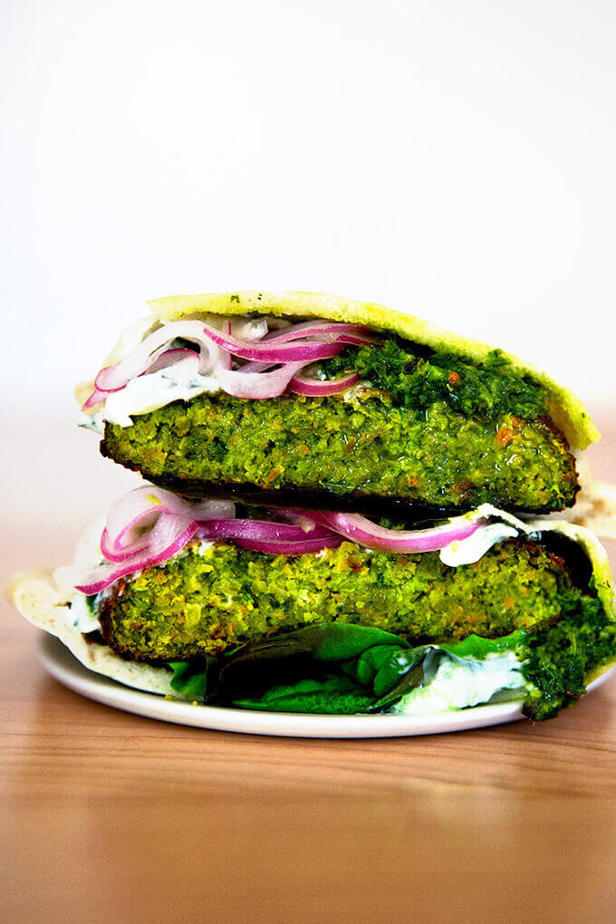 A falafel burger on a plate.