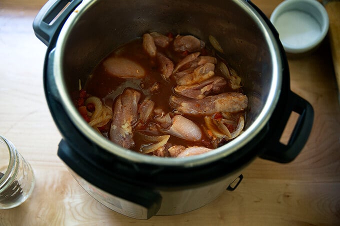 Chicken thighs added to the Instant Pot.