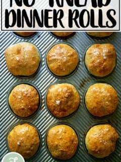 An overhead shot of thyme dinner rolls in a muffin tin.