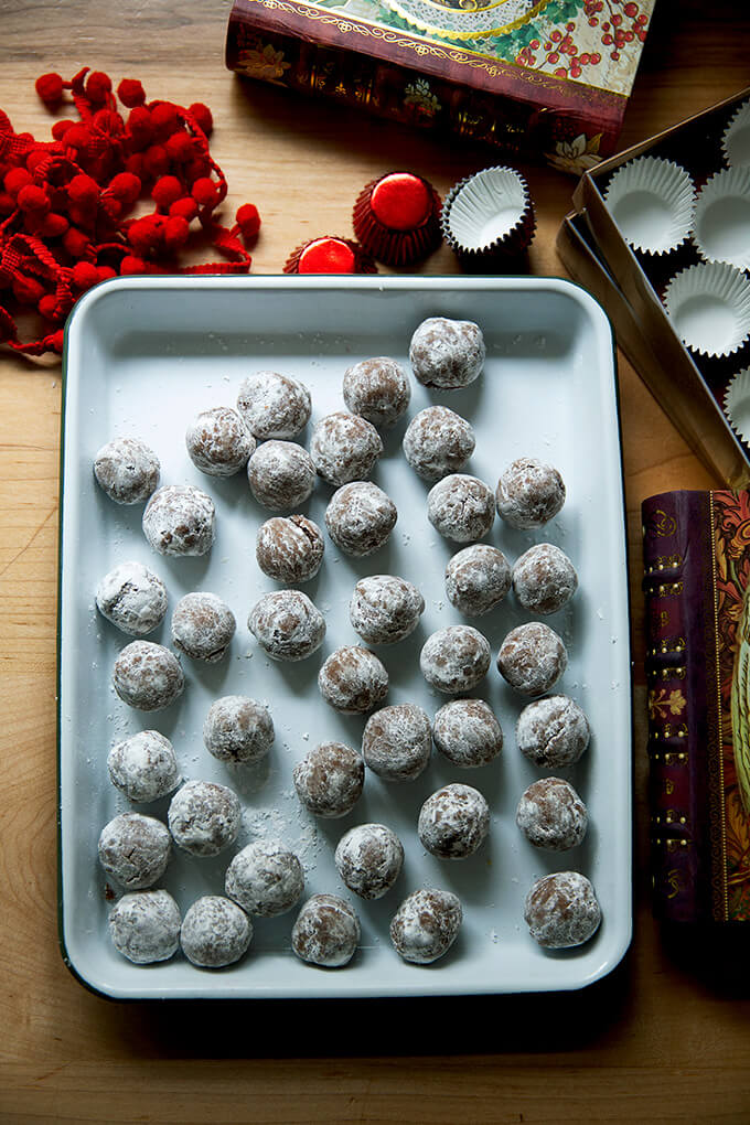 Rum balls on a sheet pan.