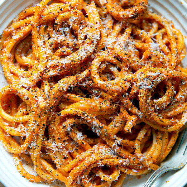 A bowl of bucatini tossed in Ina Gartens vodka sauce.