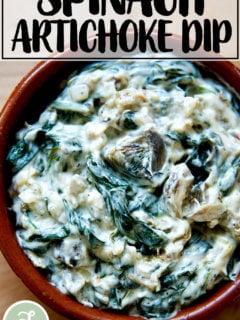 A small dish filled with spinach-artichoke dip.