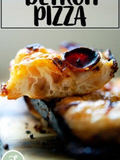 A crumb shot of a stack of 3 slices of Detroit pizza dough.