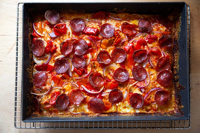 A just-baked Detroit-style pizza in pan. 