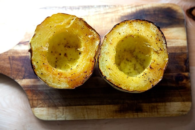 Roasted halved spaghetti squash.