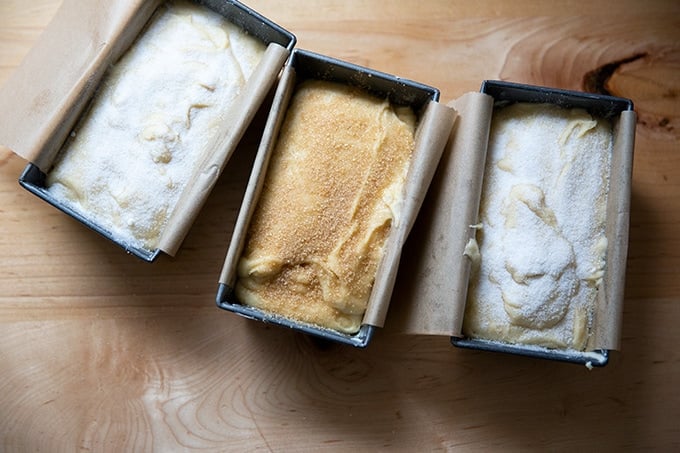 Three mini loaves of pound cake ready for the oven.