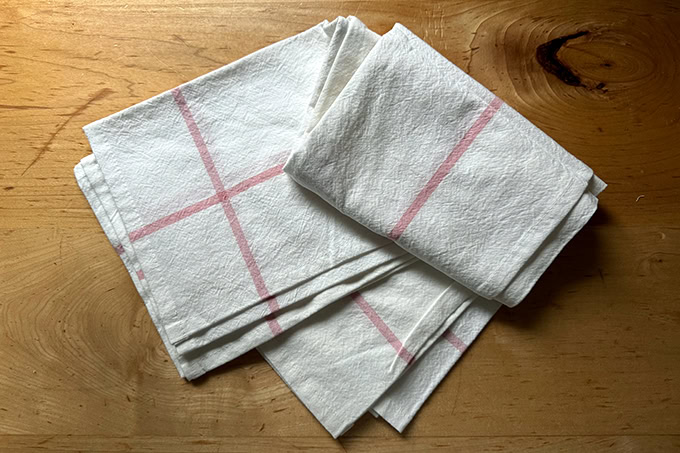 A Food52 tea towel on a countertop.