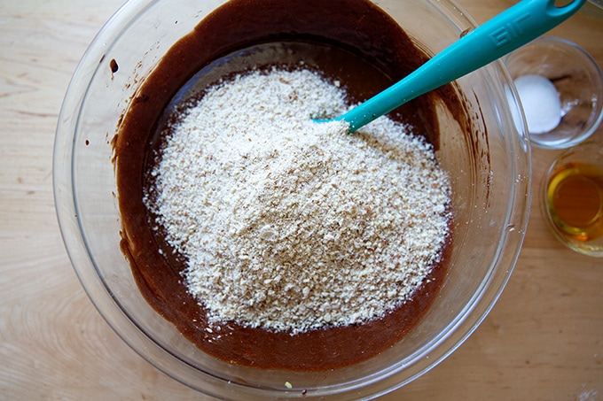 A bowl of torta caprese batter with ground almonds added.