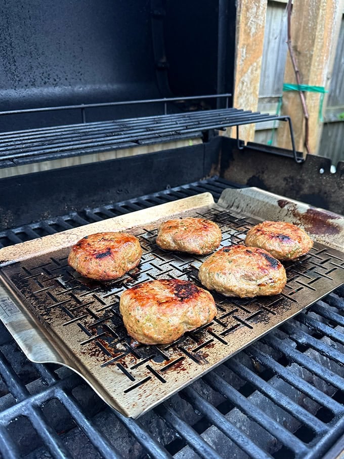Turkey burgers on the grill.